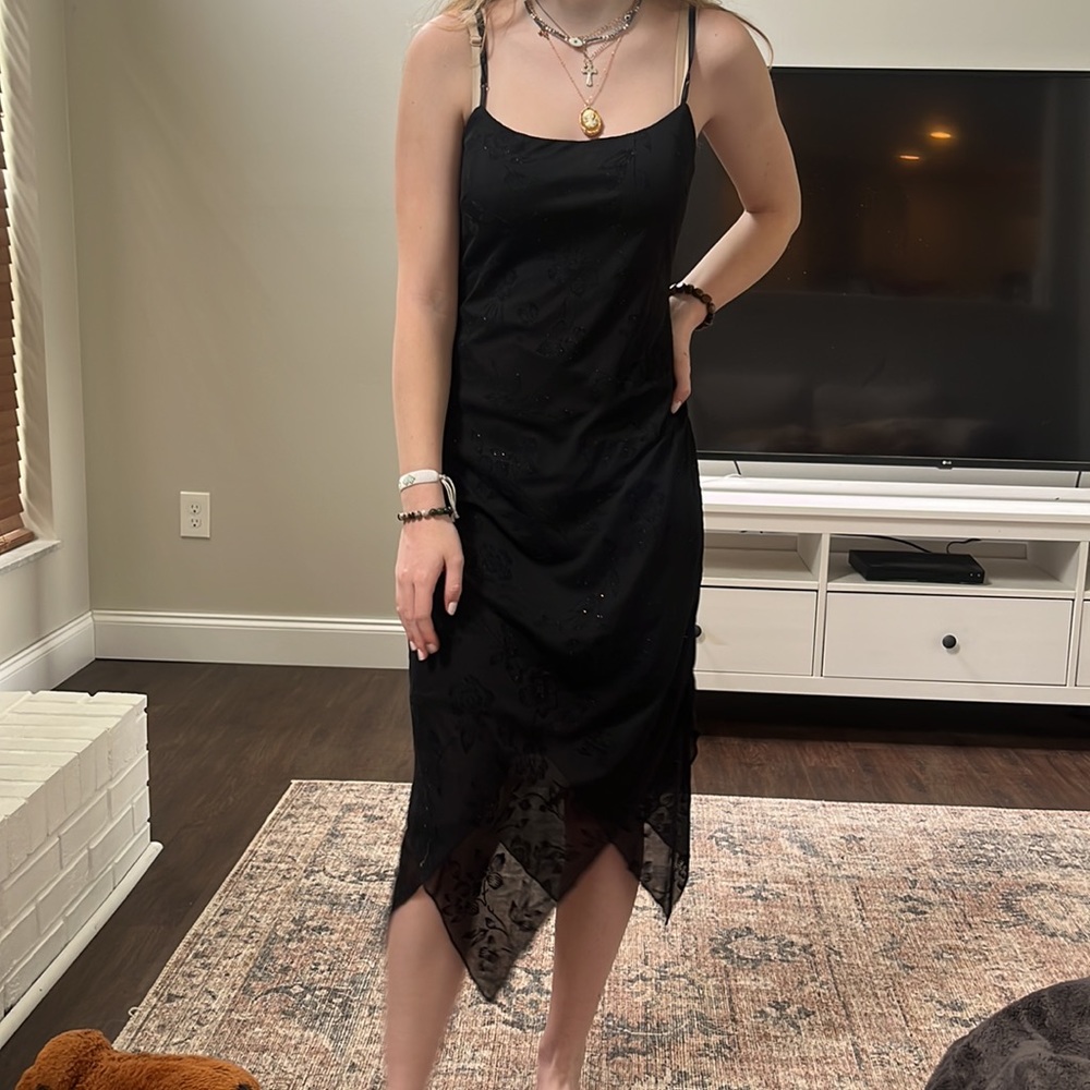 City triangles black floral lace dress with sparkle detailing.